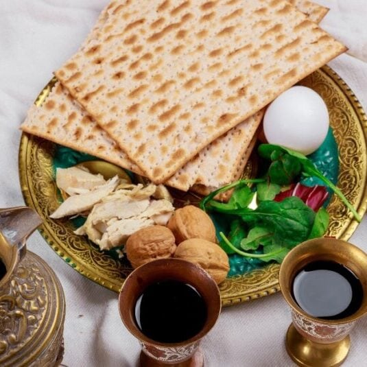 Jewish family celebrating passover, matzoh jewish holiday bread with kiddush four cup of wine SSUCv3H4sIAAAAAAAACnRUTY/bIBS8V+p/iDg3UjD+7C/opapUqafVHp6BxHSxsQxuu1rlvxdjcJ6zWSmHMG8YHvMYv33+dDiQFqzi5OvhbVn5tdJ6tm4Cp8zg4dOXiE9yEHLCiBTKmUmBxmALjncD9NKDw6z1Al9DkVgHbrbSosNadbHO8JexM854nCUZ283OySkUMS4mCb11KujThHIYdjJbYTSDKDAAwrQyqW6okKOxyoXtdkfX0L9ioDf2AY17x0x/diPdHa7+OcAAzdh0XgBkCgcnL97FvS1xJk/r+pAK8bLOl8hPqdVlmVFUX22b26X2XVkutYZBmtmSVF9P/EDum9FKwKt9JPej/S25Q0Lrn+fNpYsc+GLTpruf03aN4EG96Tyvf67IjklqCesbeVr1yctf/xD6YE8kwSyUQXb9MRz0QmBIaZwUV8MFbTOuCw84beNmHty09E3SrYk2ZoRWL12fvaZMeAfWerpIOJ5gGD46ZzAuXCCqEuFHvCwpy7Kszk8ZrfyvzktKcDA65XVCO6nBedQGhBQ7Z+8jQ4uqZmWZlfk2ufv0JEpV3Sj7IEVCU94I7zK1ctipuHG2eKVafavtk5YIDergPnSRQzMkkvKXamj/PoqRkKUvxbtURgLD7aeAxlqO/NmyutbyMouPdftCzW2vvMv76Tx2nlFk7AcDZHnzPg6BqAT+NtydQH7RuqmbgtXVaXvF90cQlrMiK7KmCtmL4mppnZSipVBIeiz8szzmjWyOdUWLI6P8lMMpL/Iz+F3X/wAAAP//AwDXApPsLgYAAA==